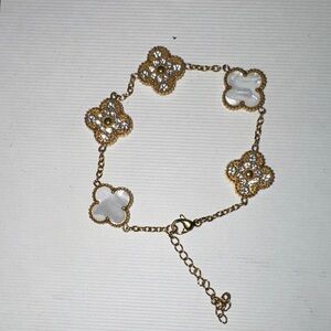Elegant Gold and White Floral Bracelet